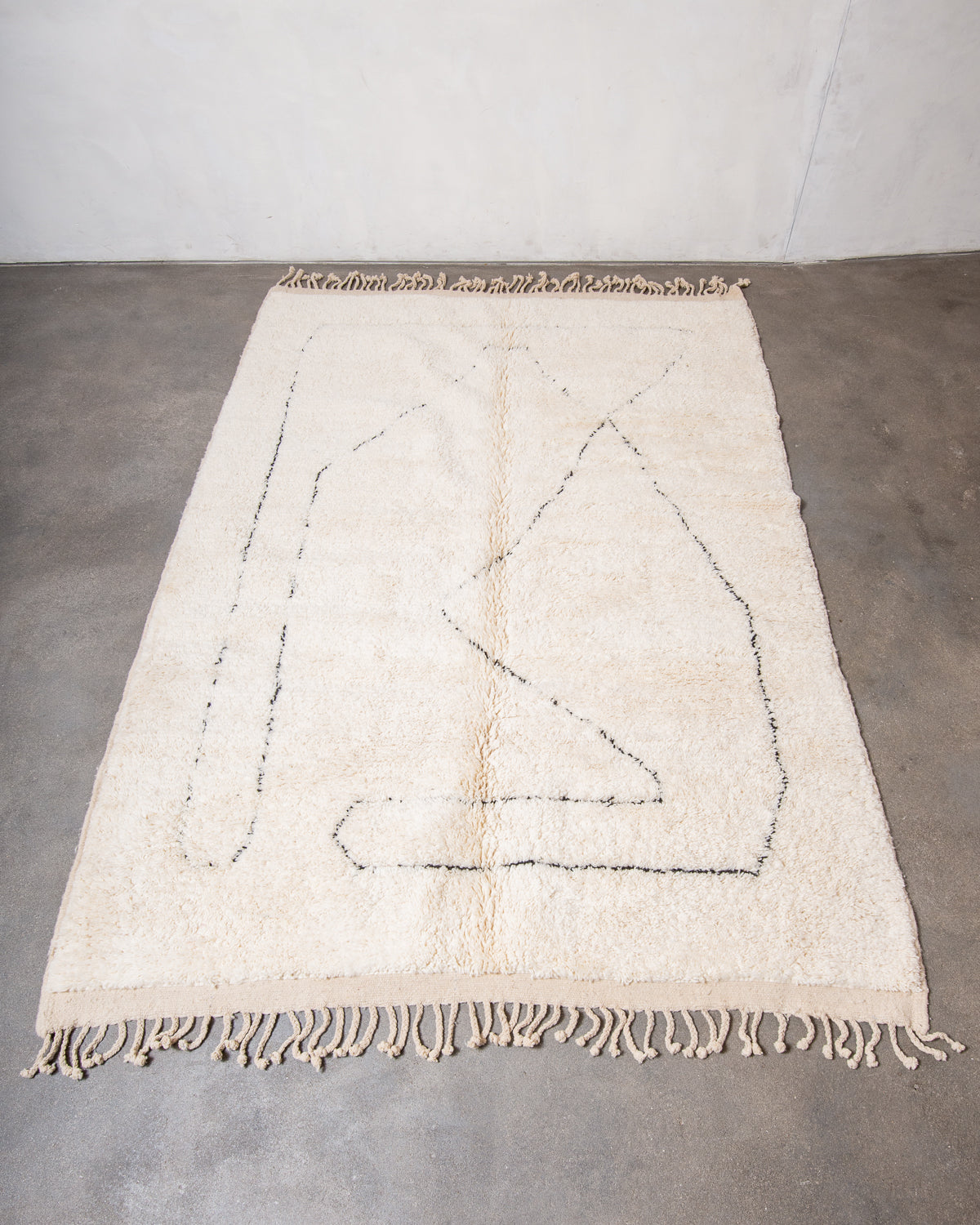 Modern, designer, handcrafted Berber rug from Morocco. Beniourain carpet with minimalist design, natural wool pile and a fluffy texture.